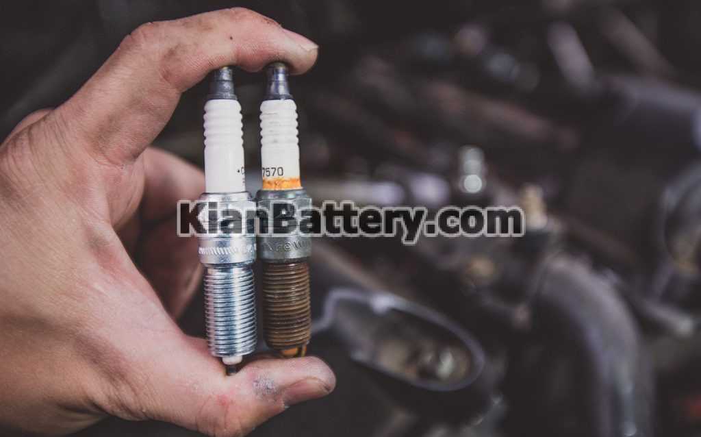 changing a spark plug 2 1024x638 علائم خرابی شمع ماشین و تشخیص آن در خودرو